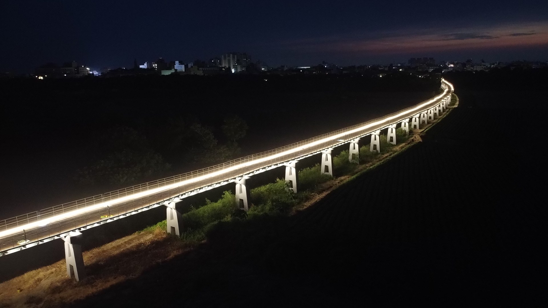 2026 北港溪復興鐵橋夜間照明 - 夕陽暮色中的復興鐵橋全景
